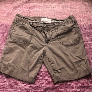 Chocolate brown Bermuda shorts. Mid thigh